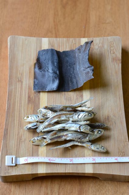 Dried Anchovies and Kelp for stock with a ruler on cutting board