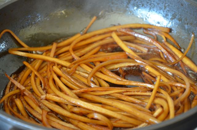 burdock braising in soy sauce in pan