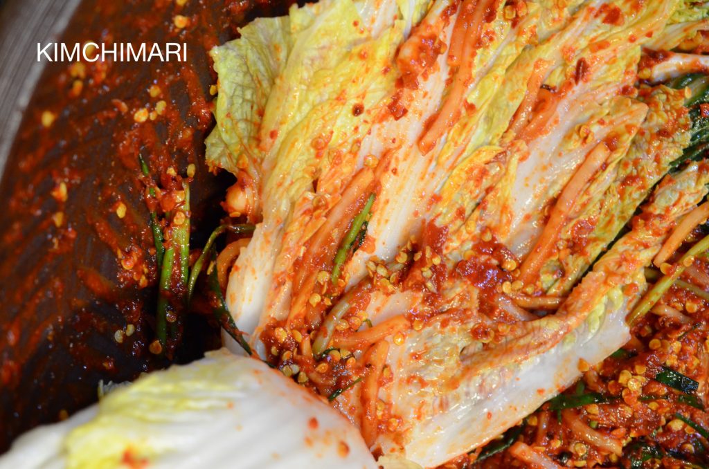 Stuffing cabbage Kimchi with kimchi yangnyeom (seasoning)