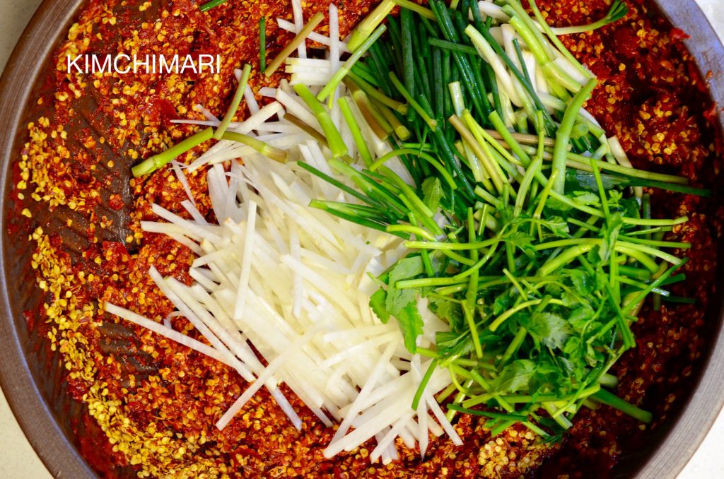 Radish and minari (water dropwort) for kimchi yangnyeom