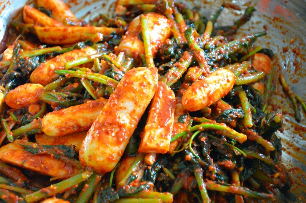 Young Radish Kimchi mixing in bowl