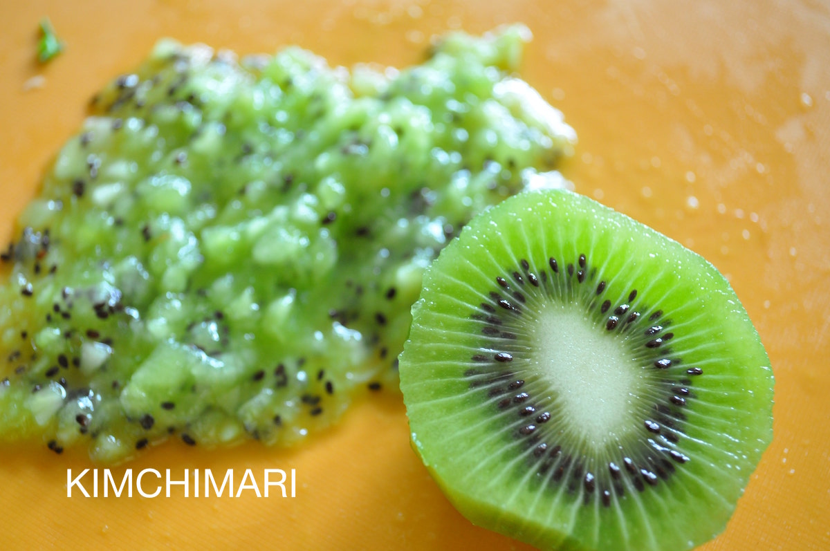 chopped kiwi on cutting board