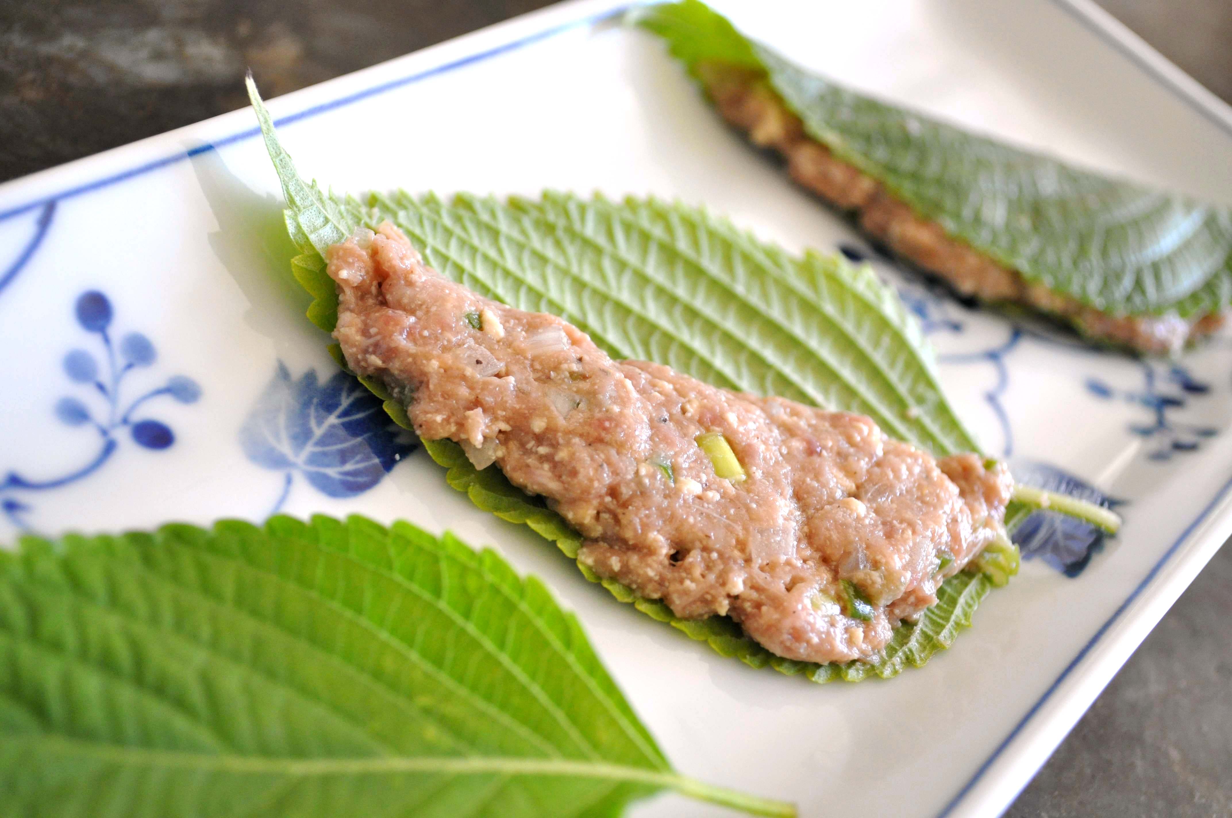 filling kkaetnip with meat tofu mixture