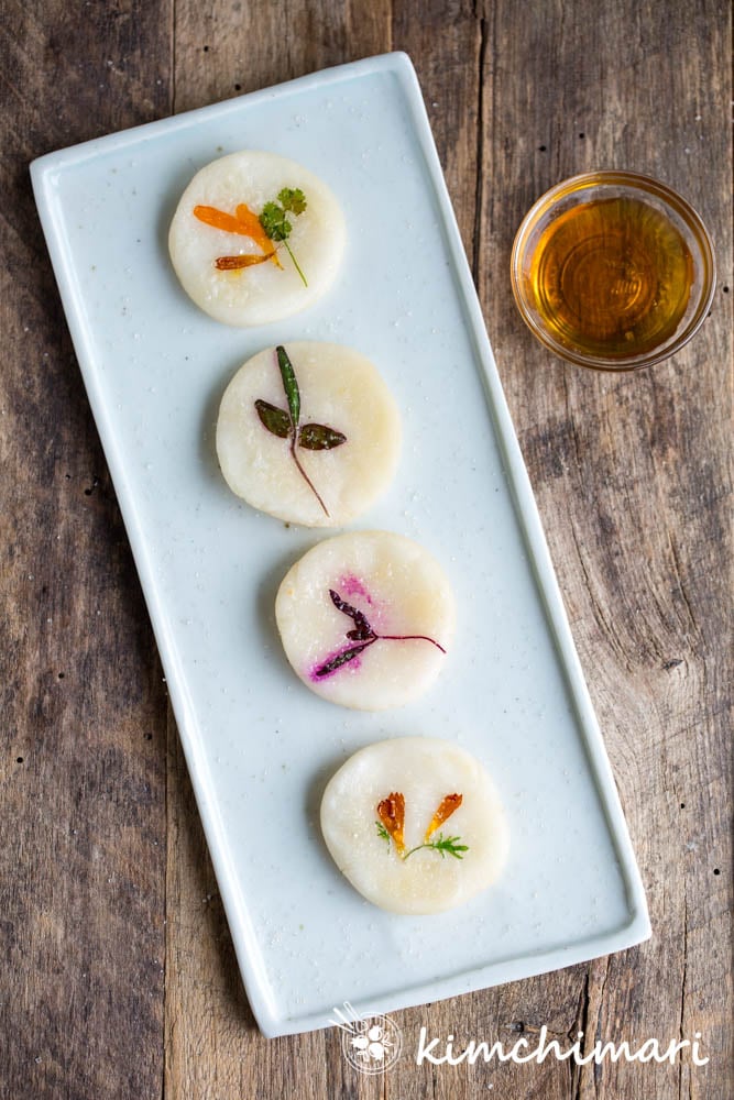 Korean Flower Pancake - hwajeon - laid out on recetangular plate served with honey