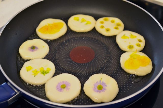 Korean Hwajeon (fresh flower sweet rice pancake) cooking in pan