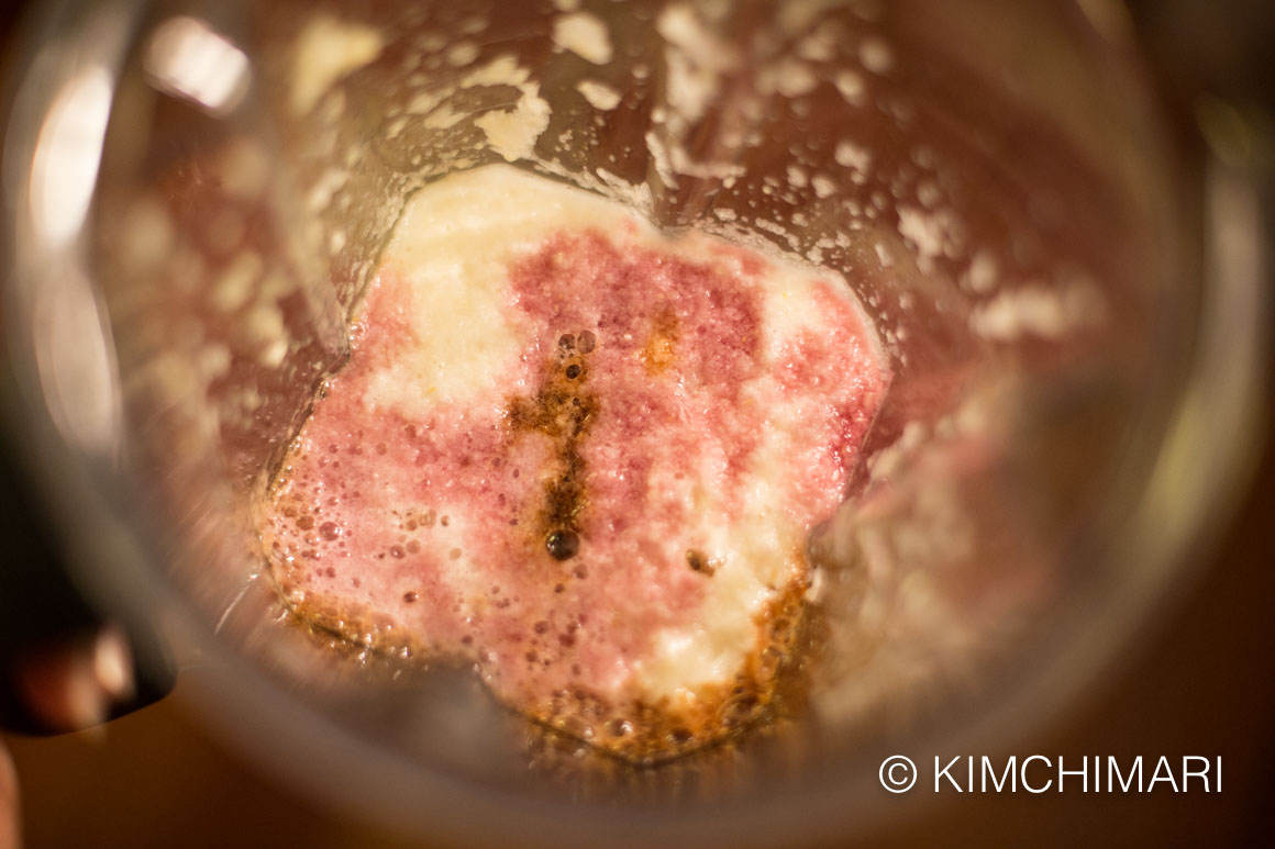 inside of the blender with the marinade