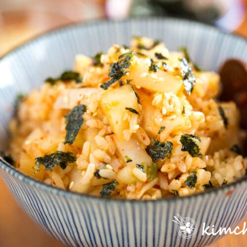 kimchi mari rice in bowl with wooden spoon