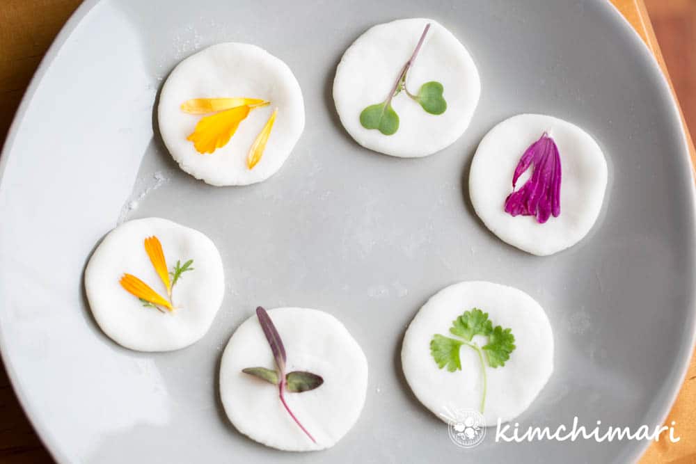 uncooked raw korean flower pancake made with different edible flowers