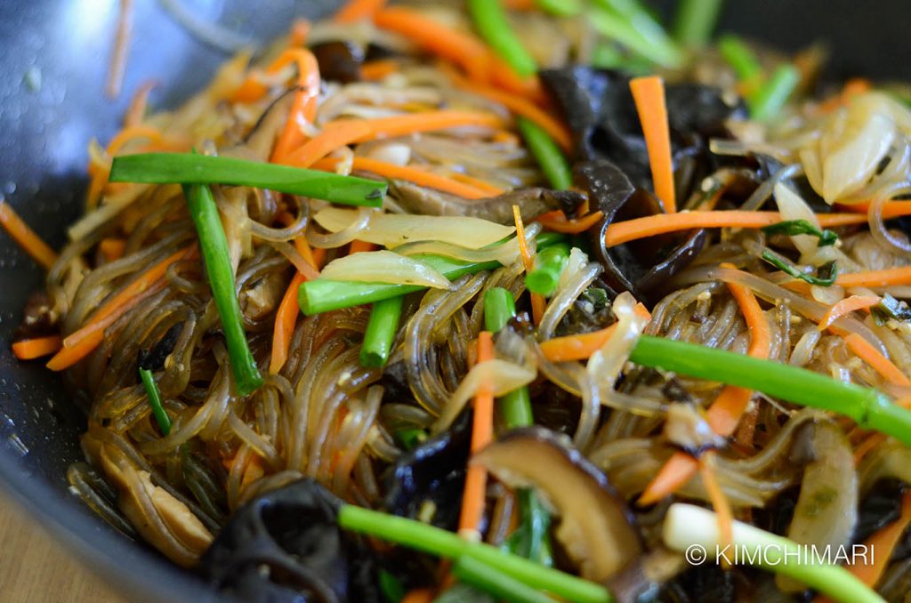 Korean glass noodles Japchae with green onions