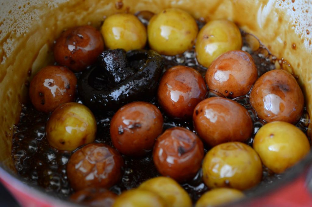 Korean potato side dish or gamja jorim almost done cooking