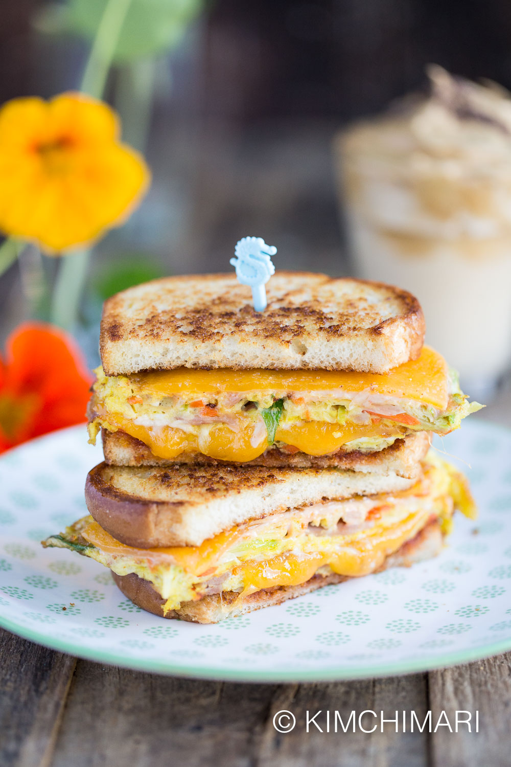 korean street toast stacked on plate with green pattern