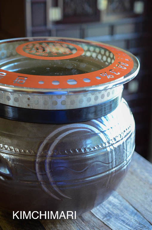 Gochujang in clay pot with glass top