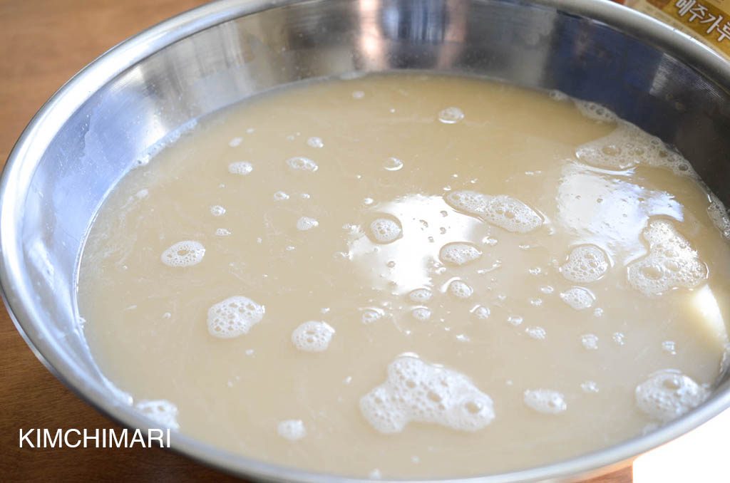 Strained Malt Barley liquid in stainless steel bowl 