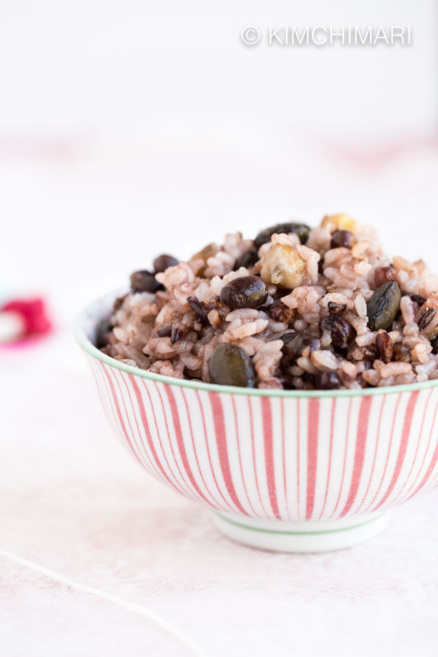 multigrain rice instant pot cooked in pink striped bowl on white background