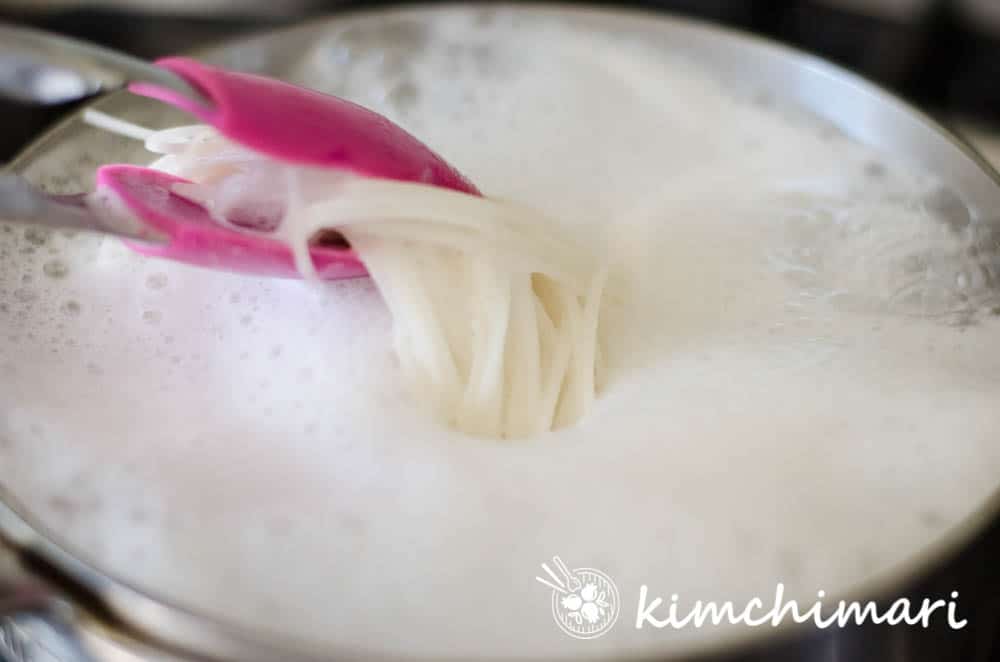 noodles cooking in pot foaming