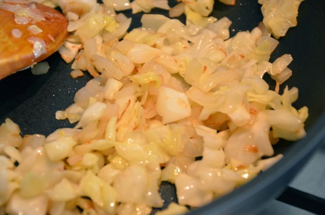 stir frying onions and cabbages